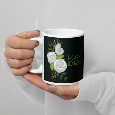 Kay Dee Hand-Drawn Glossy Mug in 11 oz size in woman's hands
