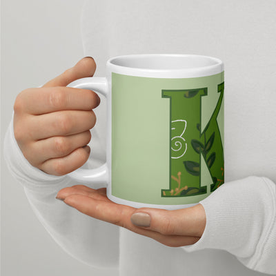 Kappa Delta Letters Mug shown in 20 oz size in model's hands in light green