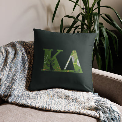 Kappa Delta Letters Sorority Pillow with filled letters on 22" x 22" dark green pillow