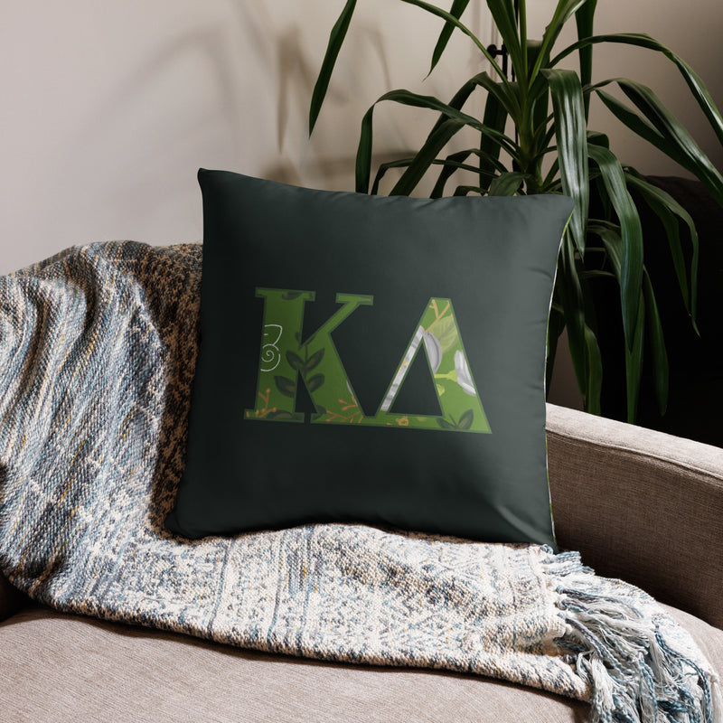 Kappa Delta Letters Sorority Pillow with filled letters on 22" x 22" dark green pillow