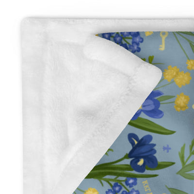 Kappa Kappa Gamma Sorority Throw Blanket shown folded with white reverse side