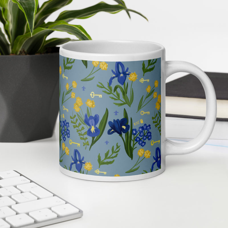 Kappa Kappa Gamma blue Fleur de Lis Floral Print Mug in 20 oz size shown in office setting