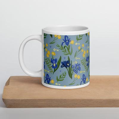 Kappa Kappa Gamma blue Fleur de Lis Floral Print Mug in 20 oz size shown on wooden cutting board