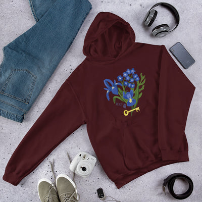 Kappa Kappa Gamma Fleur de Key Hoodie shown laying flat in maroon in lifestyle setting