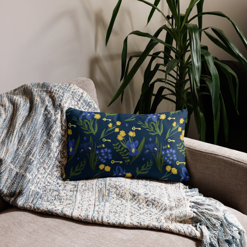 Kappa Kappa Gamma Fleur de Key Pillow showing floral print on reverse side of 20" x 12" lumbar pillow size shown on couch