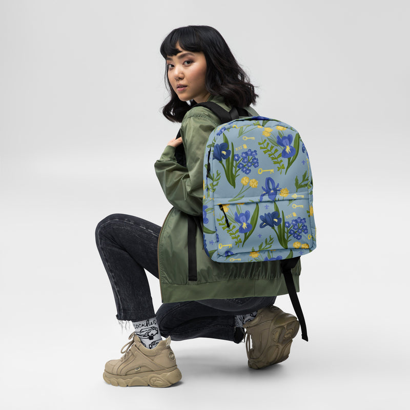 Kappa Kappa Gamma floral print backpack in light blue with fleur de lis print shown on model&