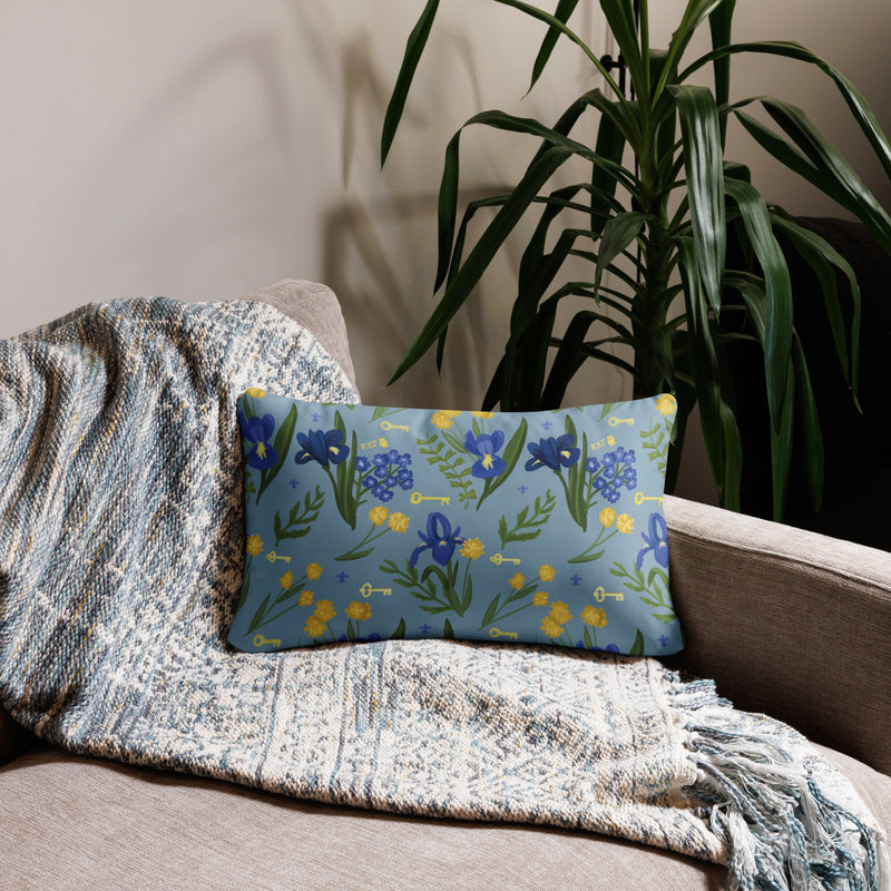 Kappa Kappa Gamma Sorority Pillow with floral print on back shown on couch