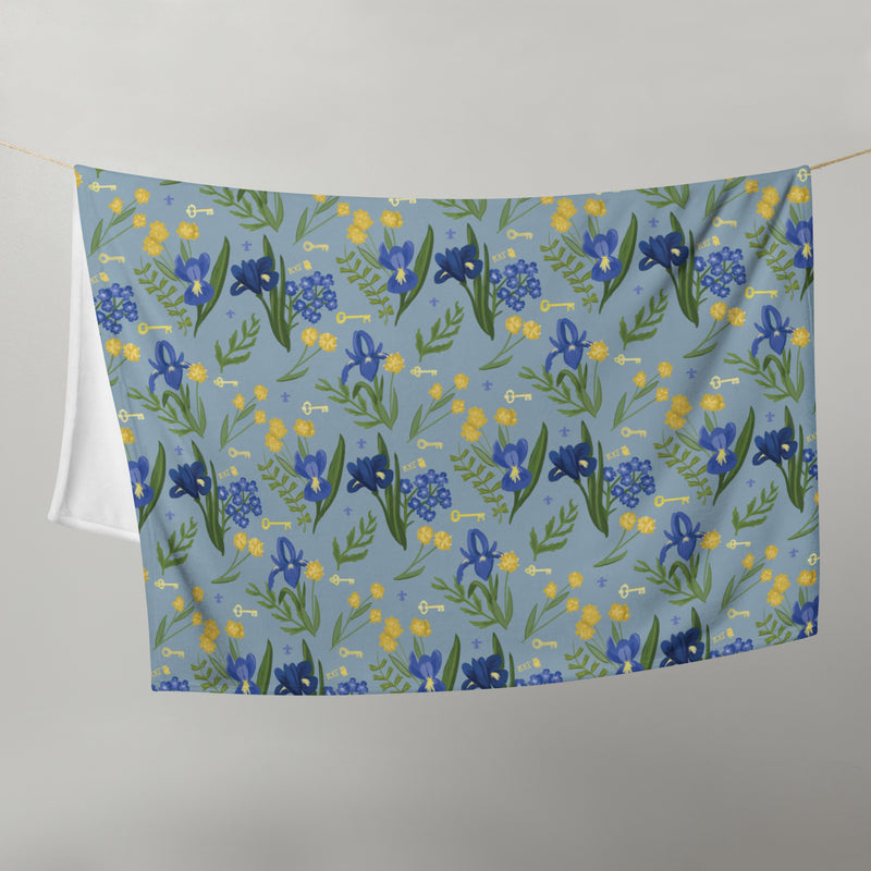 Kappa Kappa Gamma Sorority Throw Blanket shown hanging on a clothesline