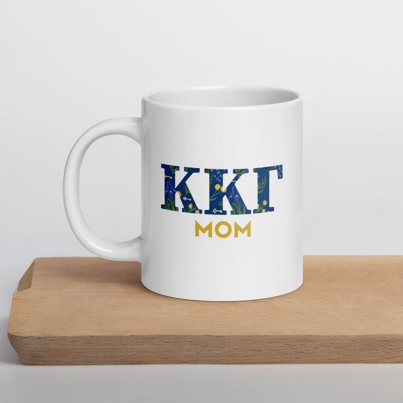 Kappa Kappa Gamma Mom Mug in 20 oz size showing front of mug with sorority letters filled with floral print