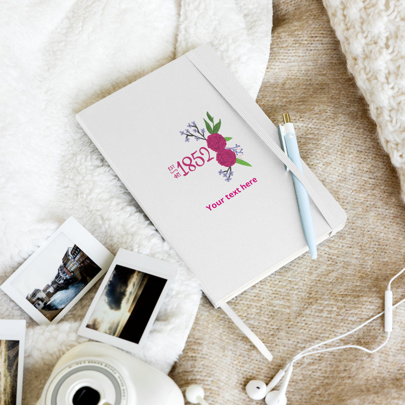 Phi Mu 1852 Personalized Journal Notebook in white in lifestyle setting