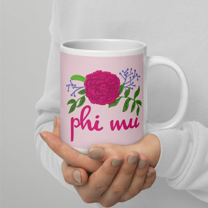 Phi Mu Rose Carnation Sorority Mug shown in 20 oz size in model&