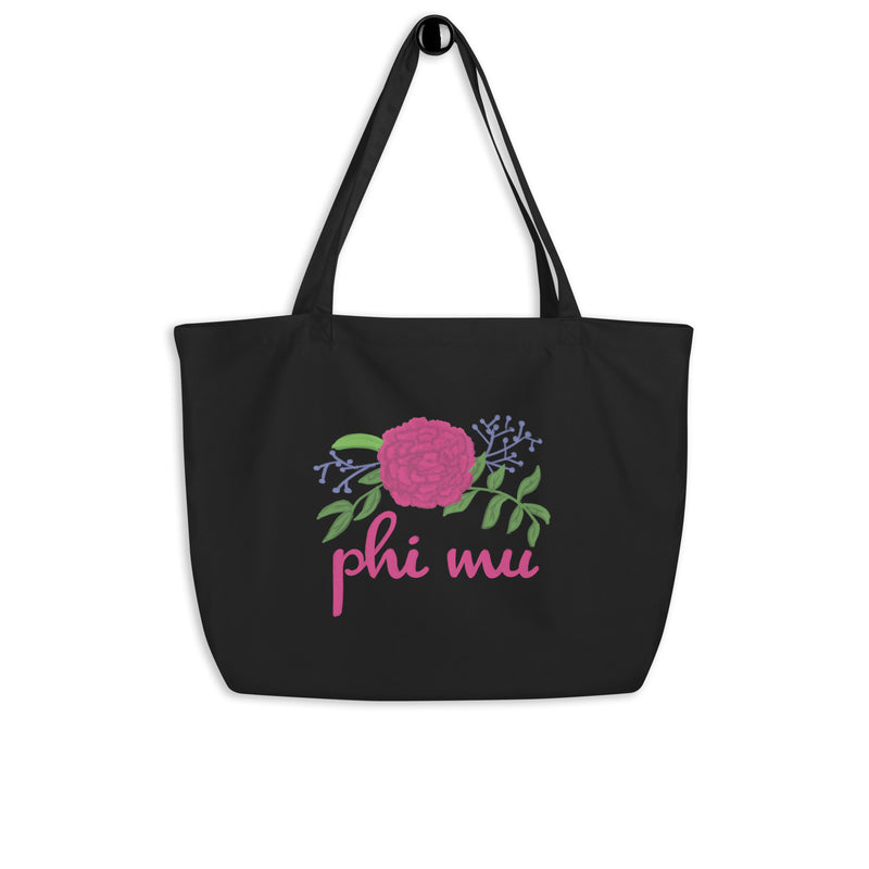 Phi Mu Carnation Tote Bag shown in black hanging on a hook