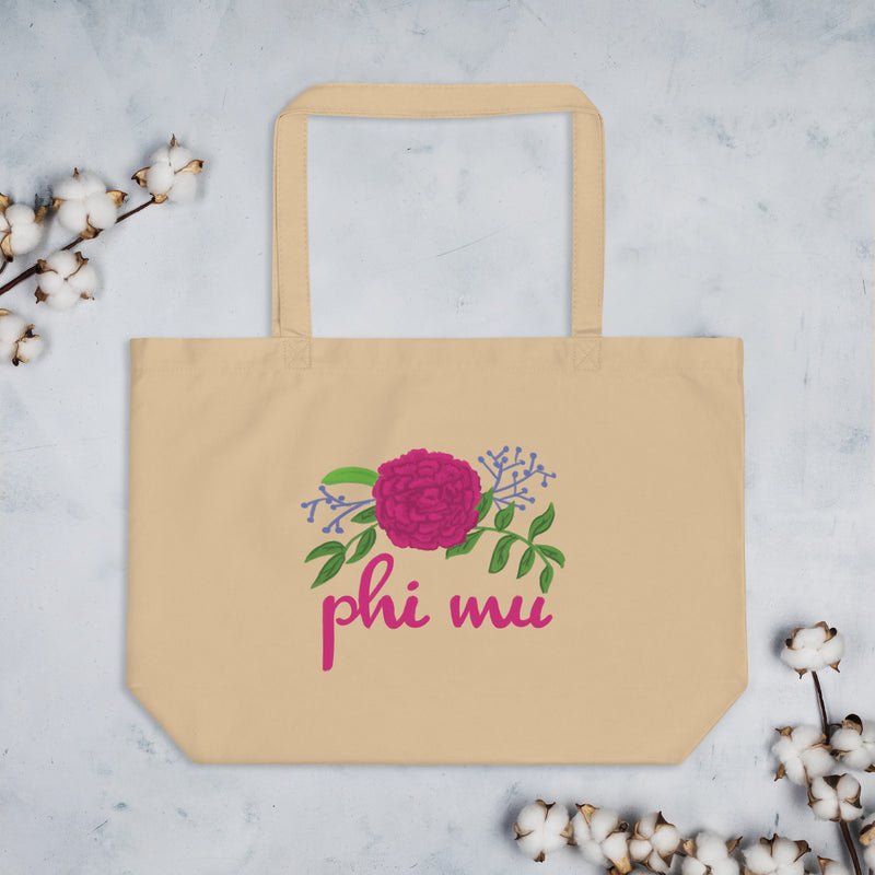 Phi Mu Carnation Tote Bag in natural oyster shown with cotton blossoms