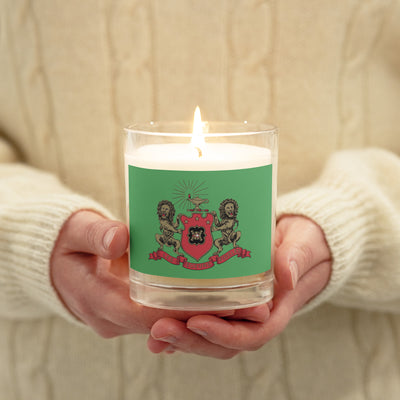 Phi Mu Crest Soy Unscented Candle in model's hands shown lit