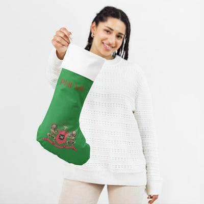 Phi Mu Coat of Arms Holiday Stocking in model's hand
