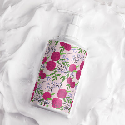 Phi Mu Carnation Floral Print Hand & Body Lotion in lifestyle setting