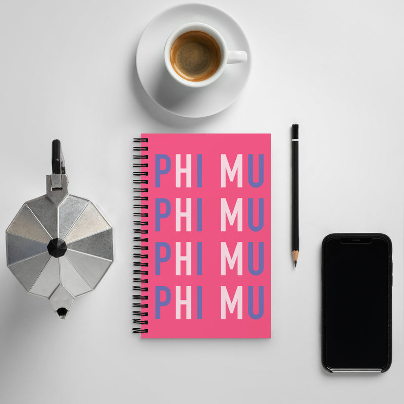 Phi Mu spiral notebook in lifestyle setting