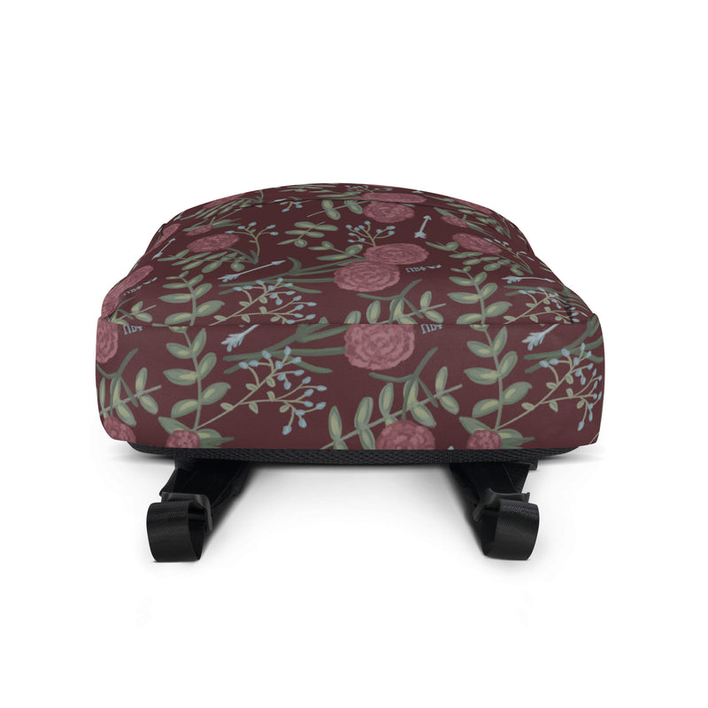 Pi Beta Phi Carnation Floral Print Backpack showing bottom of bag in wine color