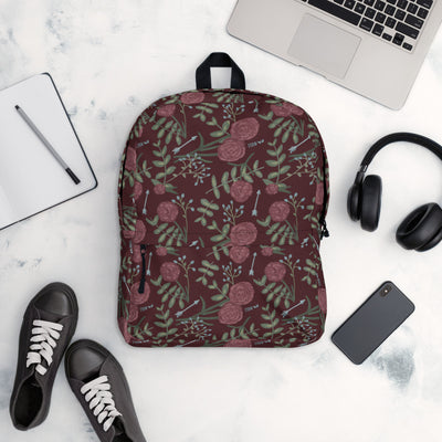 Pi Beta Phi Carnation Floral Print Backpack shown in lifestyle setting in wine color