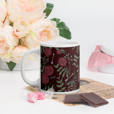 Pi Beta Phi carnation print mug in 11 oz size shown in lifestyle setting