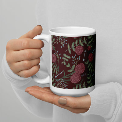 Pi Beta Phi carnation print mug in 15 oz size shown in model's hands