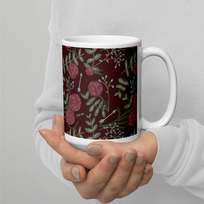 Pi Beta Phi carnation print mug in 15 oz size shown in model's hands