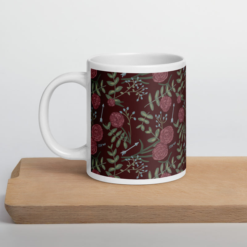 Pi Beta Phi carnation print mug in 20 oz size shown on cutting board