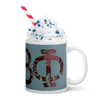 Pi Beta Phi filled letters mug in 11 oz size shown with whipped cream and straw
