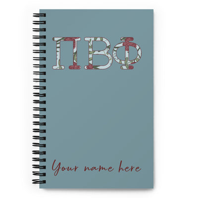Pi Beta Phi Filled Letters Notebook in silvery blue with filled letters in a carnation floral print