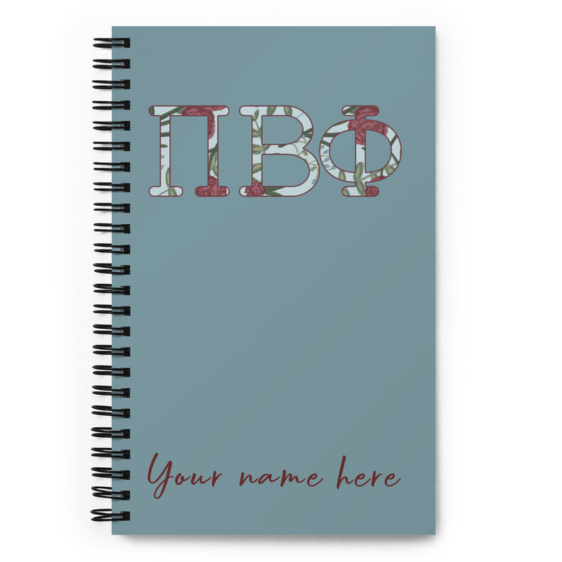 Pi Beta Phi Filled Letters Notebook in silvery blue with filled letters in a carnation floral print