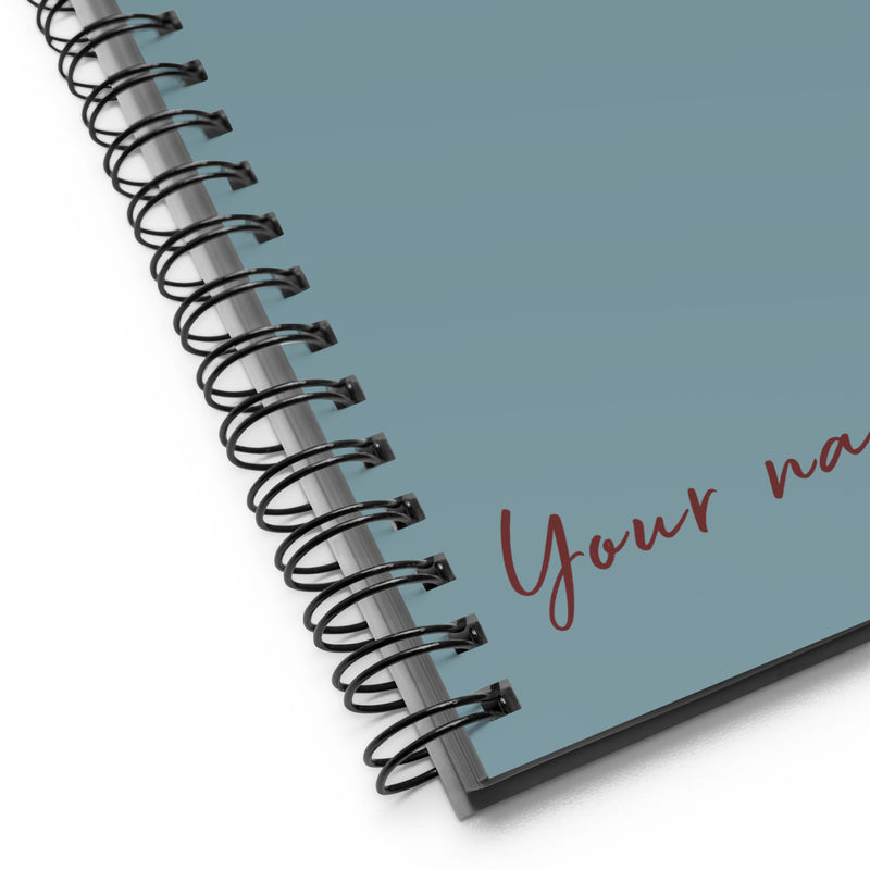 Pi Beta Phi Filled Letters Notebook in silvery blue with filled letters in a carnation floral print shown in detail view
