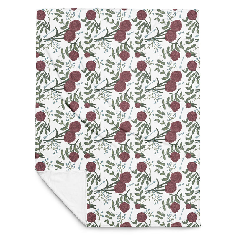 Pi Beta Phi floral throw blanket in white in 50" x 60" size shown in full view with white reverse side