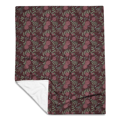 Pi Beta Phi floral print throw blanket in wine color shown in 50" x 60" size showing solid white reverse side