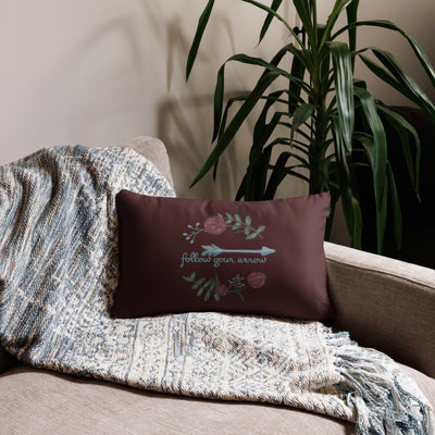 Pi Beta Phi follow your arrow pillow in 20" x 12" size shown on couch in wine color