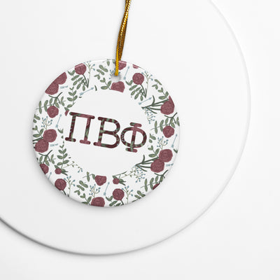Pi Beta Phi holiday ornament with filled letters and carnation floral print