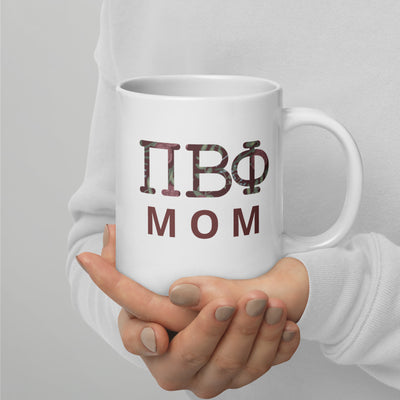 Pi Beta Phi Mom Mug in 20 oz size shown in model's hands