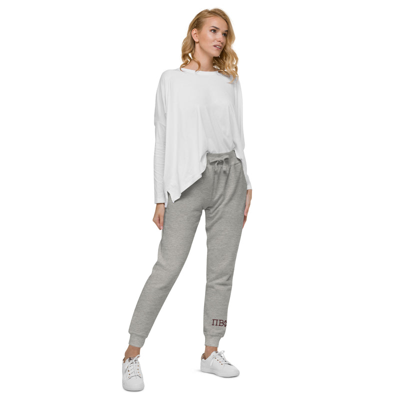 Pi Phi carbon gray sweatpants printed with your Pi Phi letters in burgundy shown in side view on model