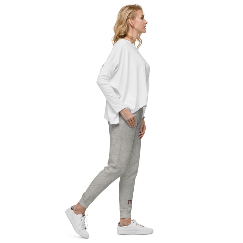 Pi Phi carbon gray sweatpants printed with your Pi Phi letters in burgundy shown in right side view on model