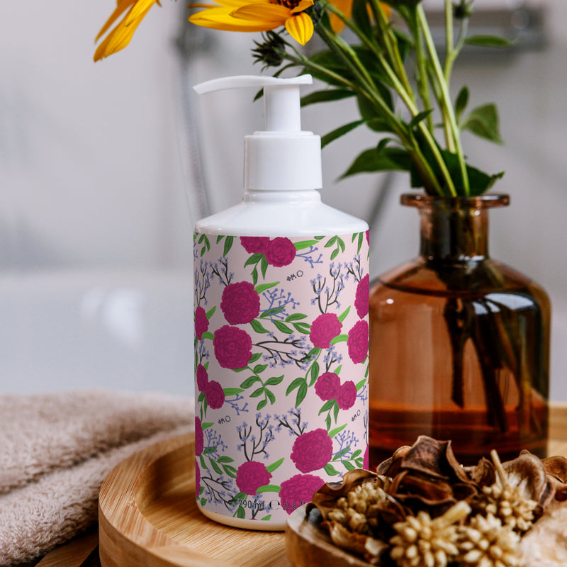 Phi Mu Carnation Floral Print Hand & Body Lotion in bathroom setting