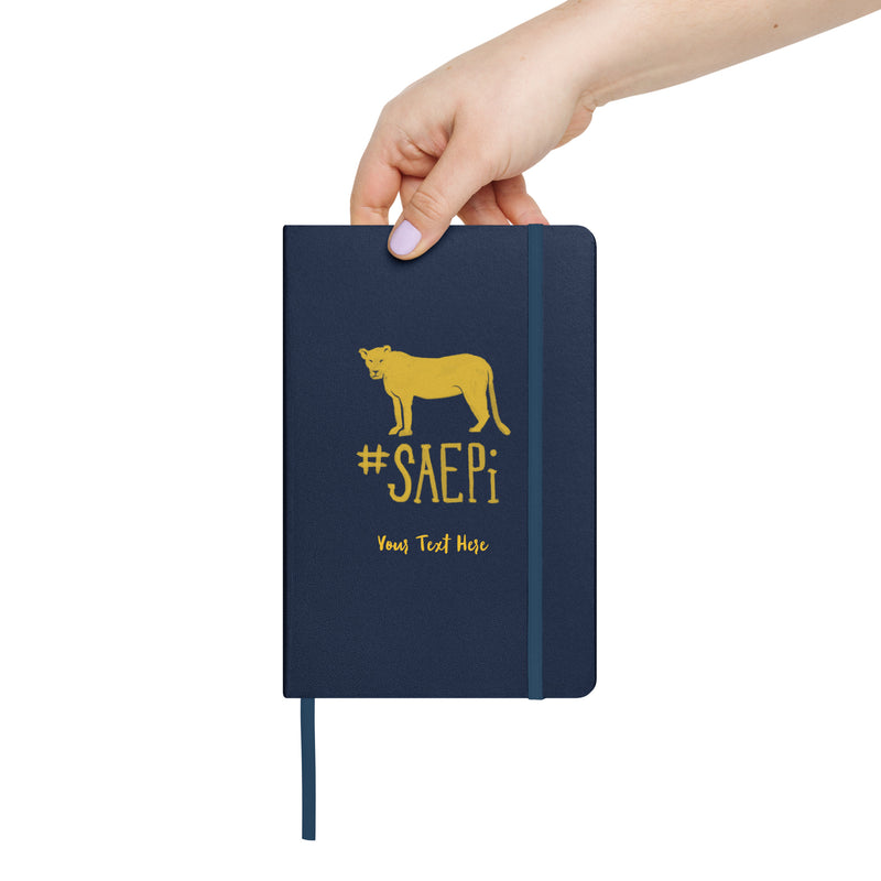 Sigma Lioness Hardcover Journal in Navy Blue shown in model&
