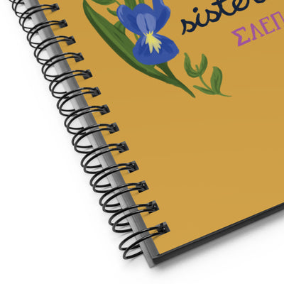 SAEPi motto Spirit Strength Sisterhood Notebook in gold shown in detail view