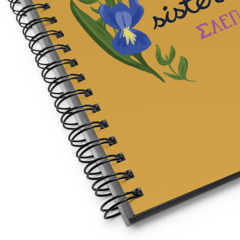 SAEPi motto Spirit Strength Sisterhood Notebook in gold shown in detail view