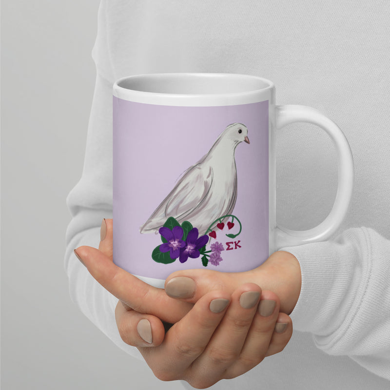 Sigma Kappa Dove Mascot Mug in 20 oz size in lavender showing hand-drawn design in model&