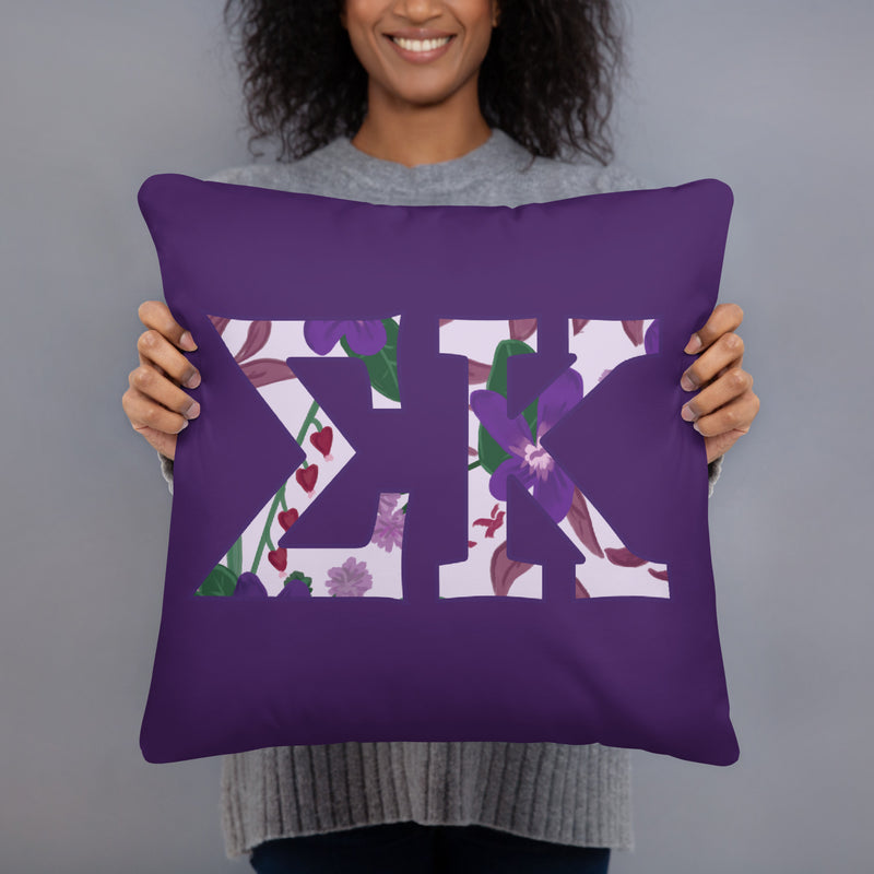 Sigma Kappa filled letters sorority pillow shown in 18" x 18" size in model&