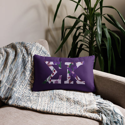 Sigma Kappa filled letters sorority pillow shown in 20" x 12" lumbar size on couch