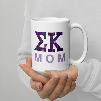 Sigma Kappa Mom Mug in 15 oz size in model's hands showing filled letters on front