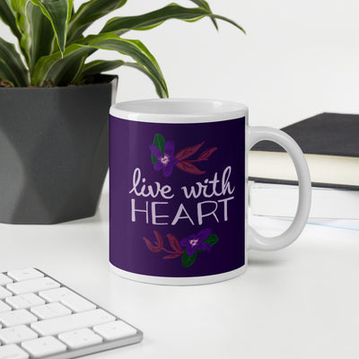Sigma Kappa Live with Heart Motto Mug in violet in 11 oz size shown in office setting