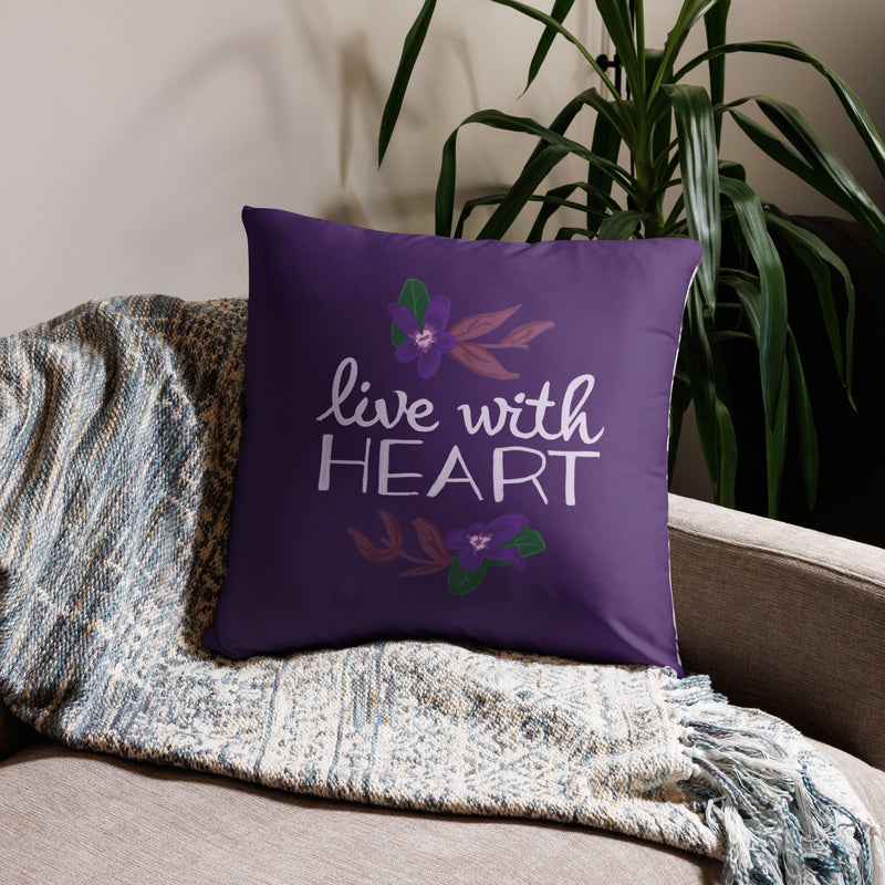 Sigma Kappa sorority motto pillow in 22" x 22" size showing front of pillow on couch