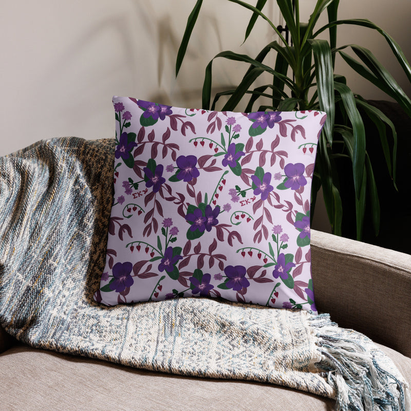 sigma kappa sorority pillow showing back with violet floral print shown on couch