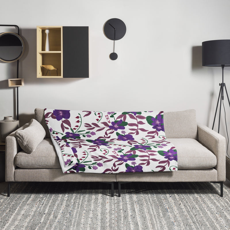 Sigma Kappa Violet Floral Print Blanket in white with violet floral print shown in 50" x 60" size